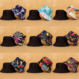 Selection of colorful patterned and plain black reversible bucket hats for sun protection