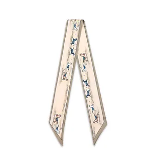 Detailed macro view of narrow silk scarf featuring elegant horse pattern for women