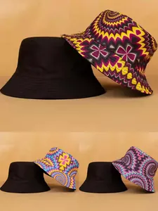 Double-sided reversible bucket hats with vibrant psychedelic prints and solid black