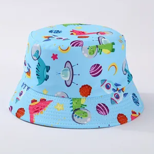 Detailed view of kids' blue bucket hat with space dinosaur patterns and durable stitching