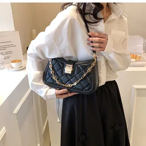 Elegant black quilted shoulder bag with gold chain strap and square buckle detail