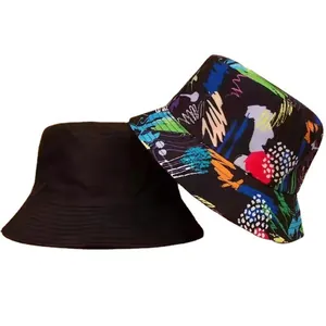 Reversible double-sided bucket hat featuring solid black and vibrant abstract graffiti print