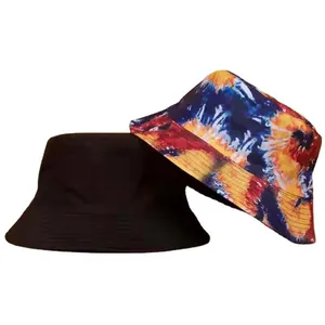 Stylish reversible tie-dye and solid black cotton bucket hat for outdoor sun protection