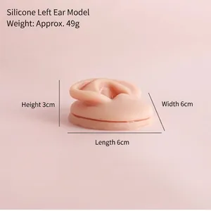 Detail view of silicone ear model for piercing practice with dimension labels