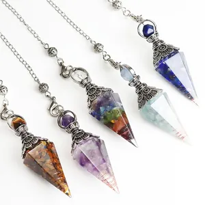 Detailed view of five conical crystal pendants filled with colorful crushed natural stones.