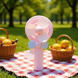Pink lollipop shaped hand-pressed portable mini fan for kids picnic toy gift