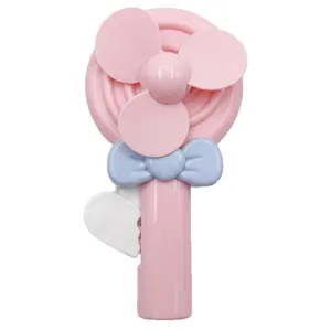 Pink lollipop hand-press mini fan with blue bow decoration, portable toy for kids