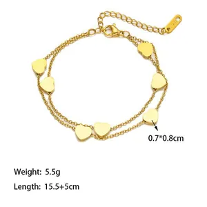 Double-layered golden titanium steel bracelet with heart charms and adjustable chain