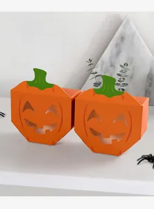 Detailed view of Halloween pumpkin candy boxes with hollow Jack-o'-lantern faces