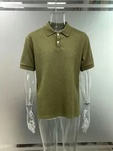 Detail of men's olive green jacquard polo shirt with button placket and ribbed collar.
