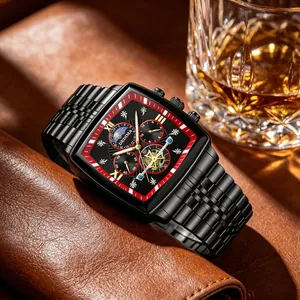 Close-up of elegant tonneau-shaped men's watch with black steel strap and moon phase