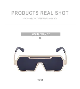 Front view of gold-frame steampunk sunglasses with integrated dark lenses.