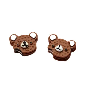 Pair of simulated chocolate bear cookie resin charms for DIY crafts and phone cases.