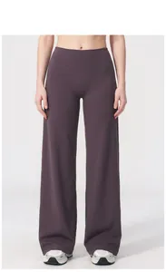 Macro detail view of eggplant purple wide-leg yoga pants for women's daily fitness