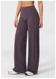 High-waisted wide-leg yoga pants for women featuring a slim fit in deep purple fabric