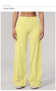 Front view of model wearing pale yellow high-waisted wide-leg leisure yoga pants