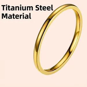 Minimalist gold-plated titanium steel ring featuring a high-polish finish and sleek design