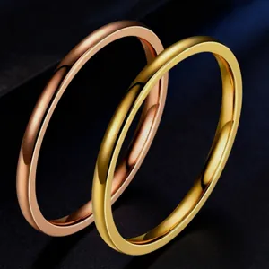 Elegant minimalist polished stainless steel ring set in rose gold and yellow gold finish