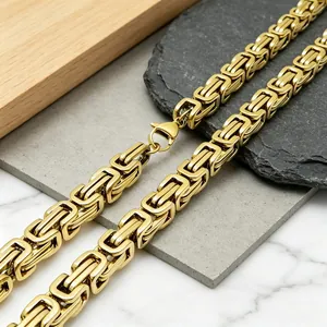 Detailed close-up view of a gold-plated stainless steel Byzantine chain necklace for men