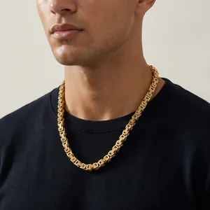 Premium bold golden Byzantine chain necklace for men in titanium steel worn by model