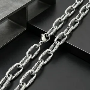 Close-up of 10mm stainless steel O-link chain with textured horizontal pattern.