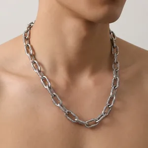 Close-up of a 10mm thick stainless steel chain necklace with horizontal ribbed texture