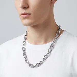 Close-up of textured stainless steel chunky O-link chain necklace on male model