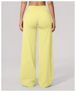 Detailed back view of light yellow high-waisted wide-leg sports yoga pants for women
