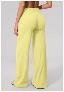Back view of lemon yellow wide-leg sports pants for women in soft brushed fabric