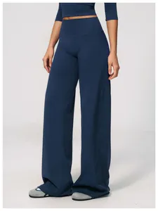 Professional front view of navy blue high-waisted wide-leg yoga pants for active women