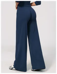 Back view of high-waisted wide-leg navy blue brushed athletic yoga pants for women