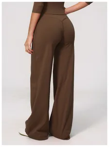Detailed back view of women's brown wide-leg brushed athletic pants for running