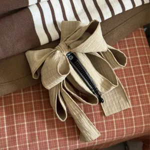 Large beige waffle texture bow hair banana clip for women elegant hair headwear