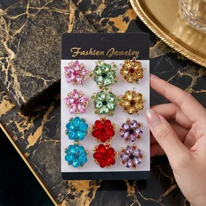Set of 12 colorful rhinestone floral brooches on display card