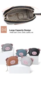 Close-up detail of a cute pig-shaped leather coin purse with an interior keychain.