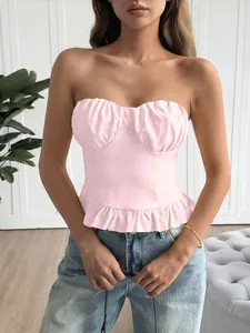 Detailed front view of a pink Y2K style strapless tube top with elegant ruffle hem