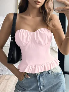 Detailed view of a stylish pink ruffled hem tube top with gathered bust for Y2K fashion