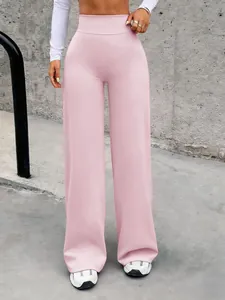 Pantaloni yoga rosa pastello a vita alta e gamba larga in tessuto elasticizzato premium