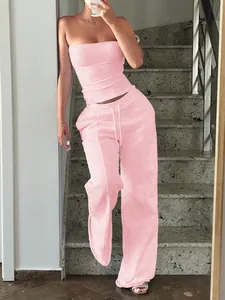 Pink two-piece set featuring a strapless tube top and wide-leg drawstring sweatpants