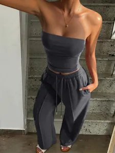 Chic dark grey tube top and wide-leg drawstring pants set for summer vacation.
