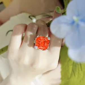 Luxury Asscher cut Padparadscha orange gemstone ring with sparkling flower accents for women