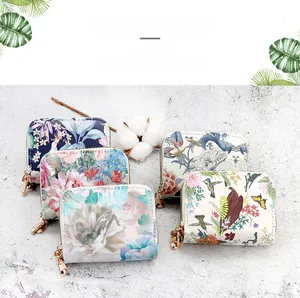 Collection of Chinese style floral accordion card bags with elegant double gold zippers