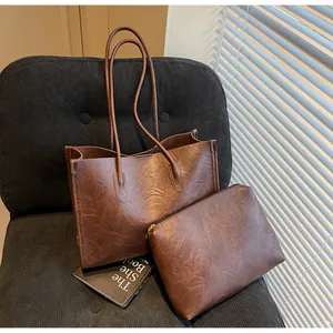 Elegant brown vintage faux leather tote bag and matching clutch set for women commute