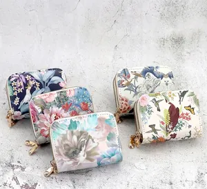 Close-up of stylish floral double zipper card holders with large capacity