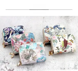 Close-up of stylish floral double zipper card holders with large capacity