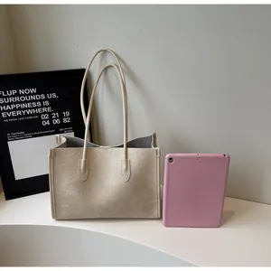 Large capacity textured beige tote bag for commuting with minimalist design