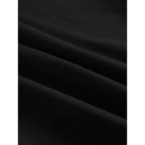 Close-up of soft black cotton fabric texture for trendy mommy style top