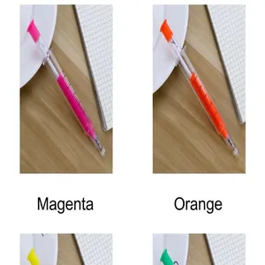 Close-up detail of creative syringe-shaped gel pens in rose red and orange colors