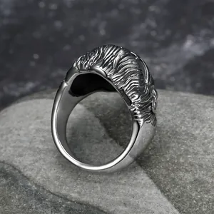 Detail view of Monkey King stainless steel ring with vintage punk hair texture.