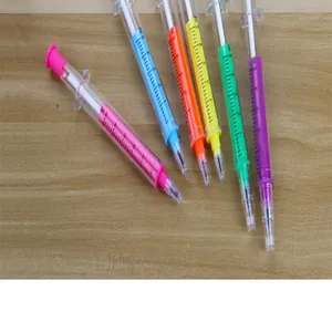 Macro detail view of colorful syringe-shaped gel pens with clear scale markings
